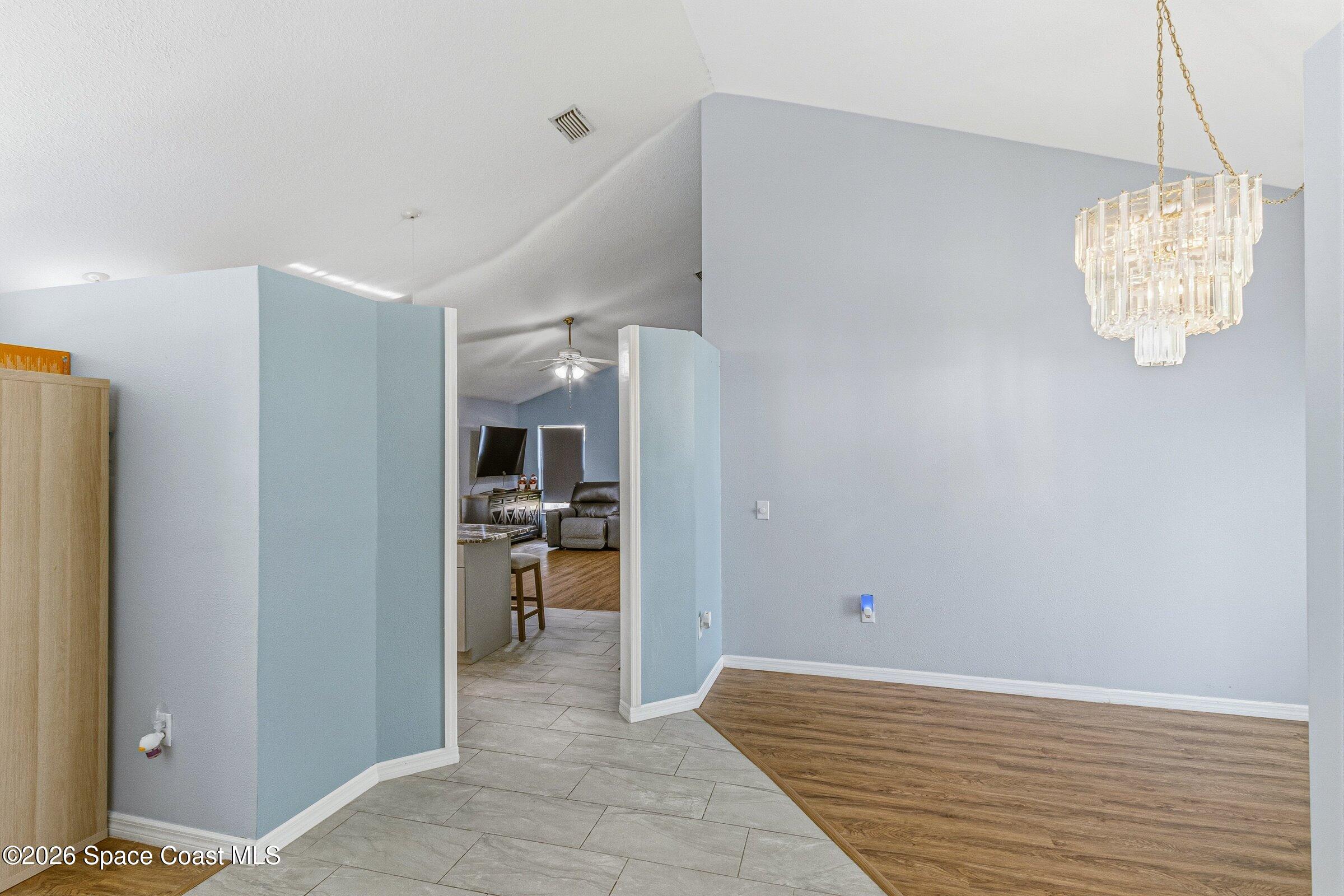 1835 Longleaf Road Cocoa, FL 32926 - Photo 8 of 55 foyer to kitchen