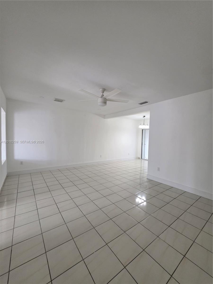 4601 Southwest 5th Street Miami, FL 33134 - Photo 14 of 23 a view of a room with an empty space and a window