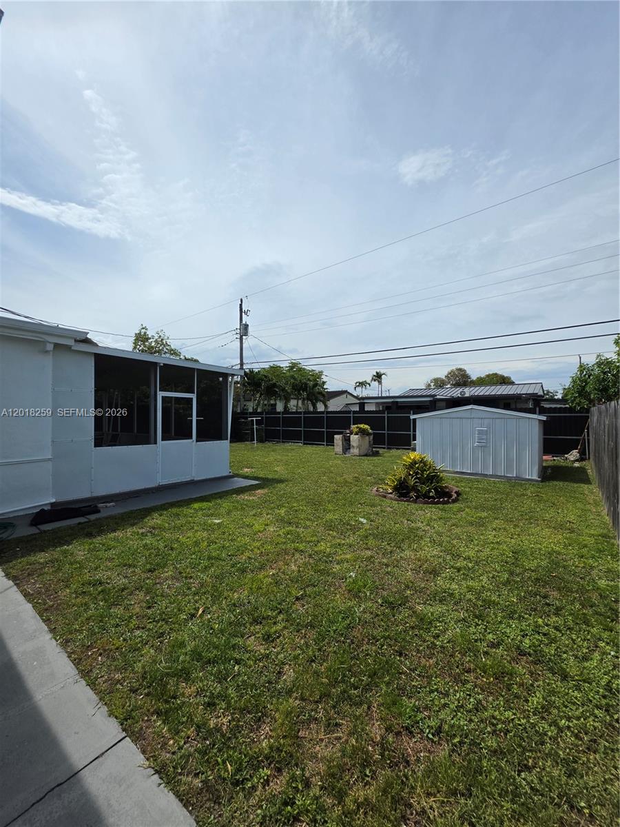 4601 Southwest 5th Street Miami, FL 33134 - Photo 2 of 23 a view of a backyard with plants and a garden
