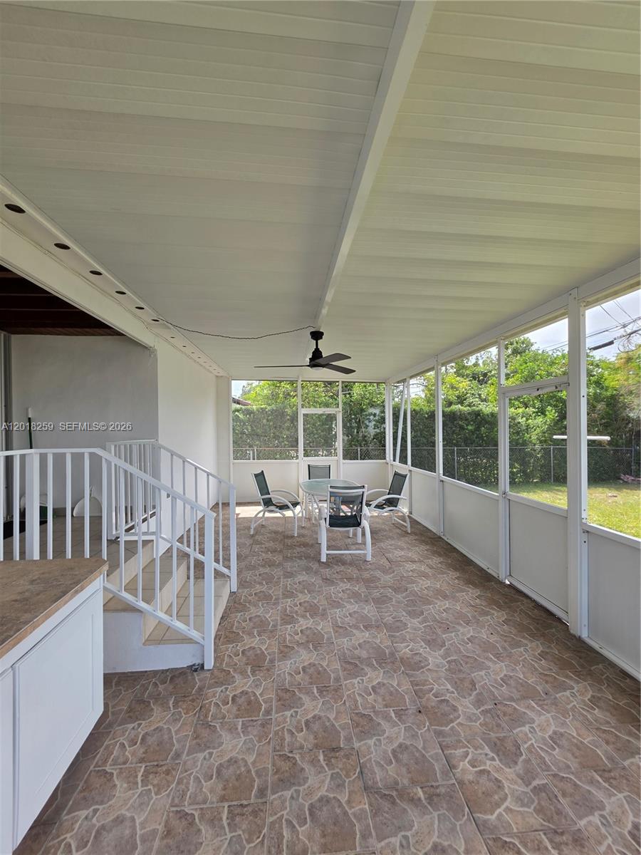 4601 Southwest 5th Street Miami, FL 33134 - Photo 6 of 23 a view of a porch with chairs and backyard