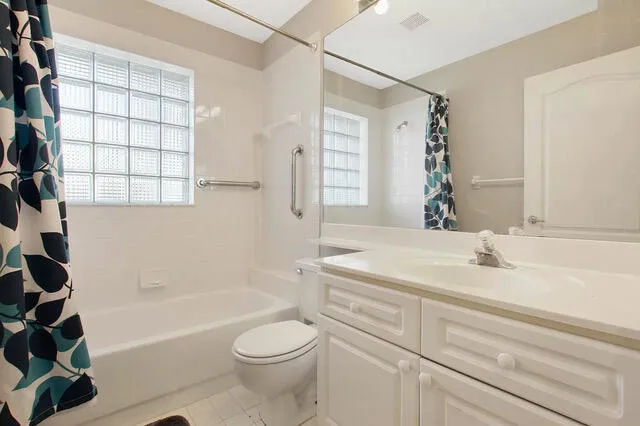 a bathroom with a sink a toilet and a bathtub