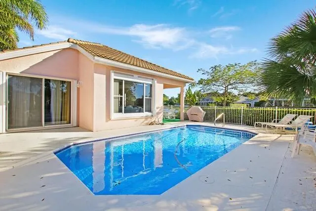 a view of a house with a swimming pool