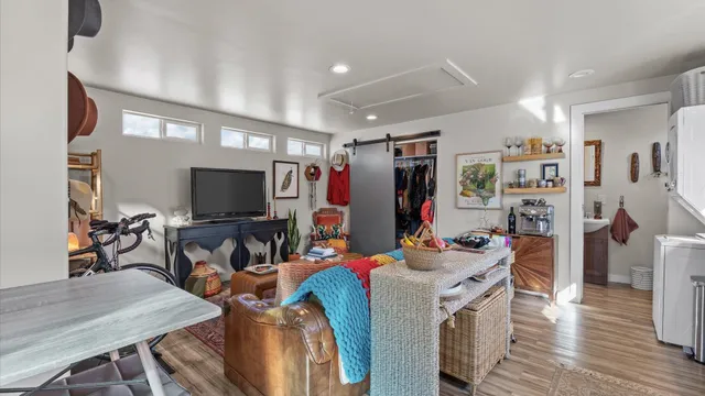 a bathroom with a sink vanity mirror and toilet