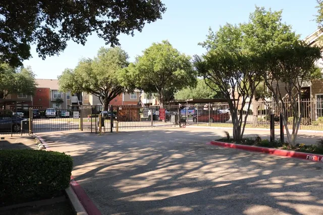 a view of backyard with trampoline
