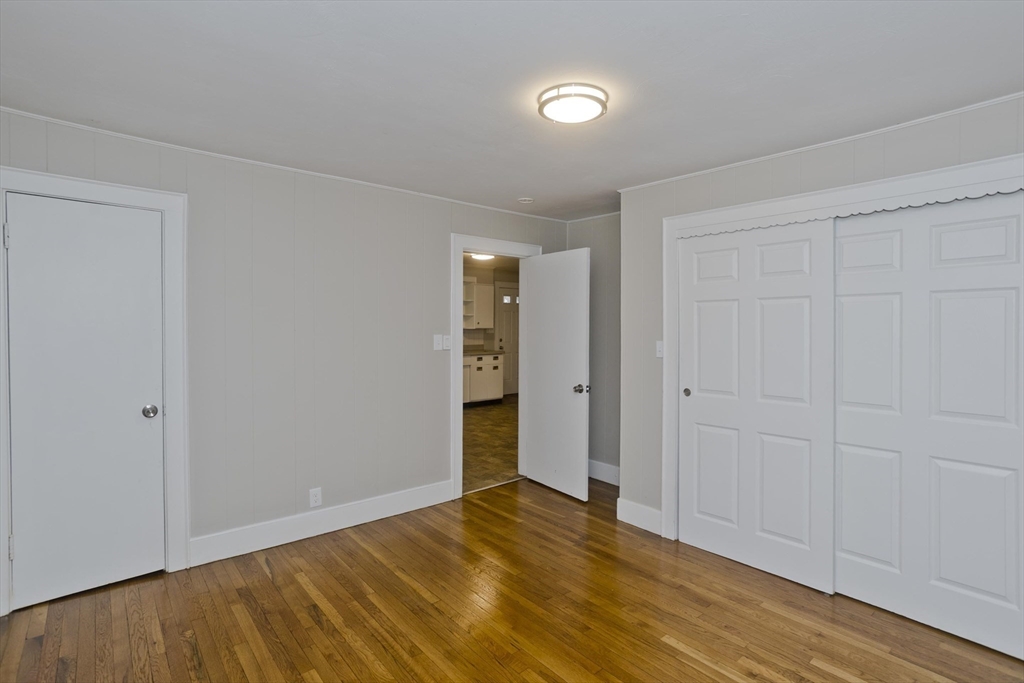 177 Marion Street Chicopee, MA 01013 - Photo 15 of 36 a view of an empty room and wooden floor