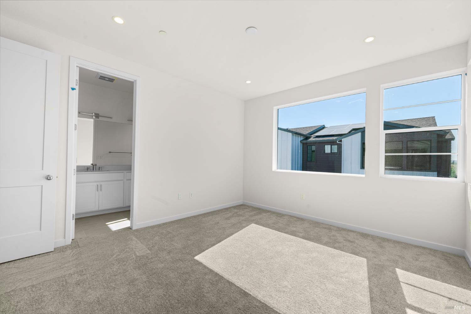 1448 Waterside Lane Rohnert Park, CA 94928 - Photo 19 of 35 an empty room with a empty space and windows