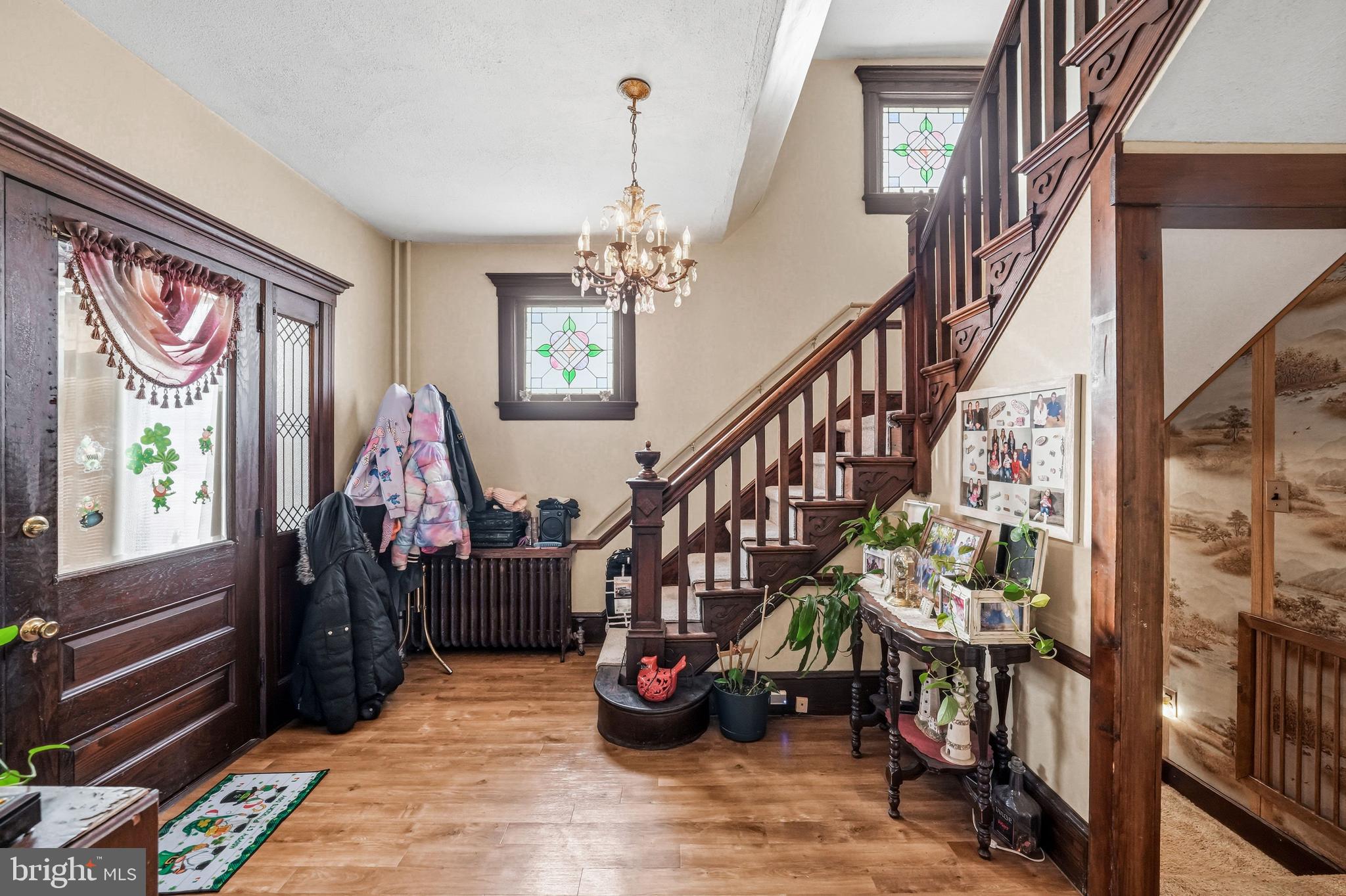 300 Delaware Avenue Riverside, NJ 08075 - Photo 11 of 86 a view of entryway with wooden floor and stairs