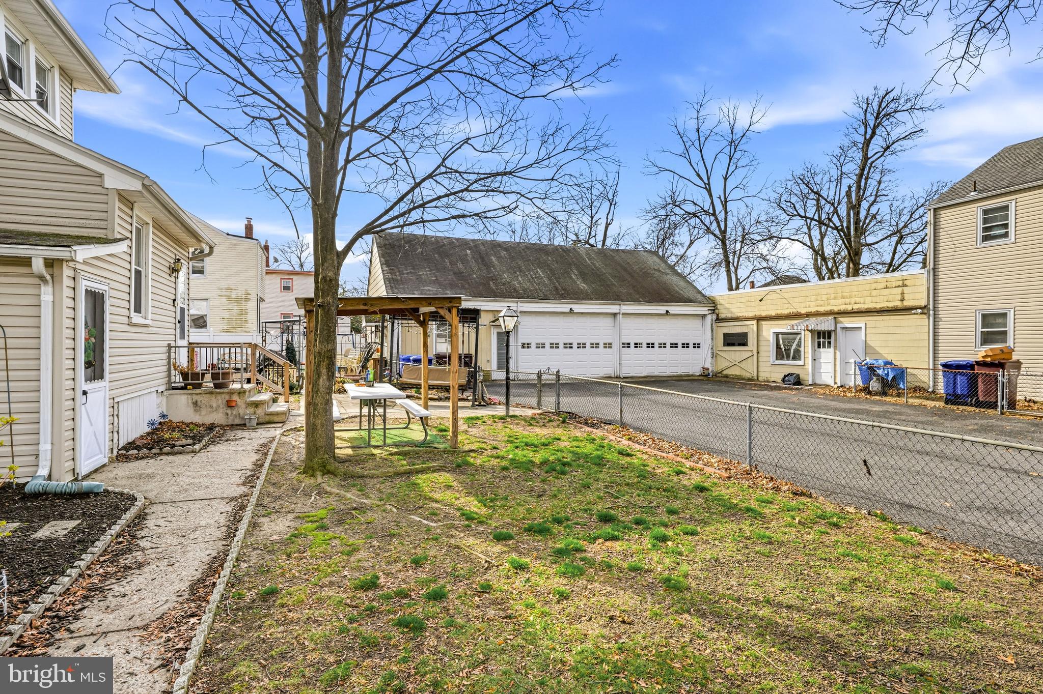 300 Delaware Avenue Riverside, NJ 08075 - Photo 40 of 86 a swimming pool with outdoor seating and yard