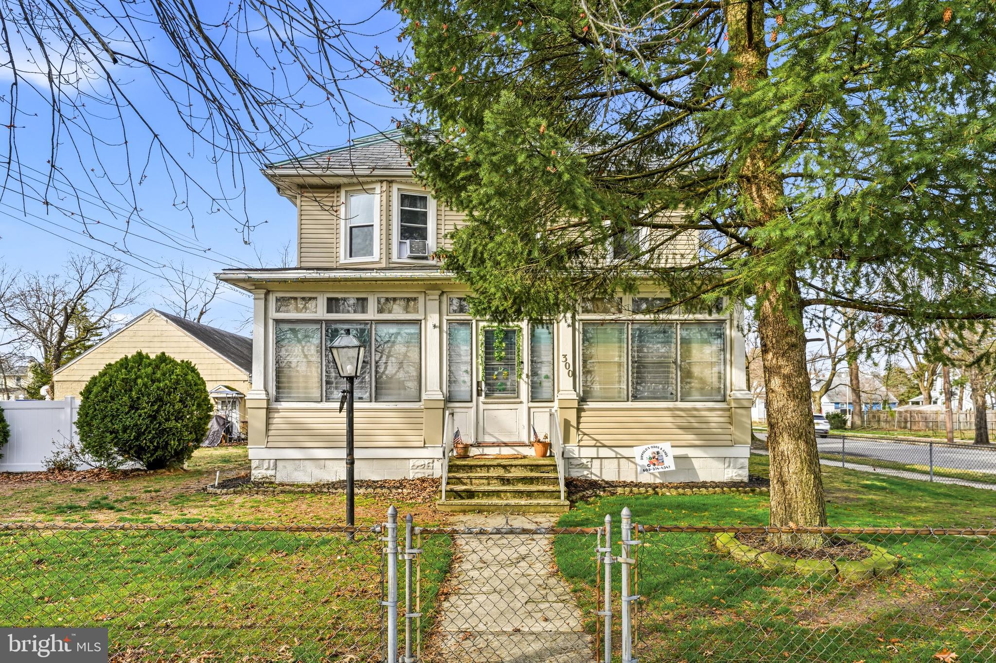 300 Delaware Avenue Riverside, NJ 08075 - Photo 6 of 86 a front view of a house with a yard