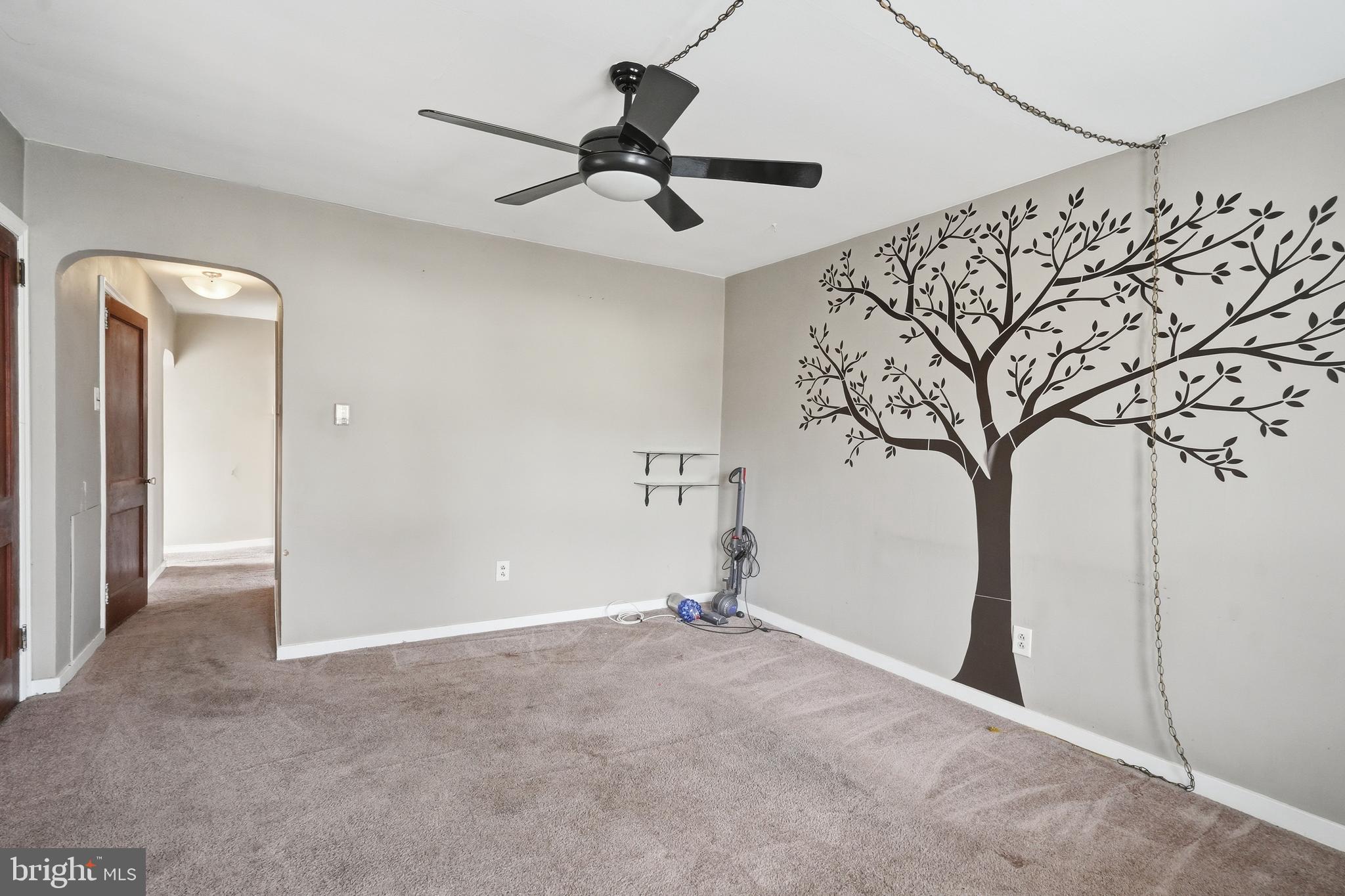 300 Delaware Avenue Riverside, NJ 08075 - Photo 66 of 86 a view of a livingroom with a ceiling fan and window