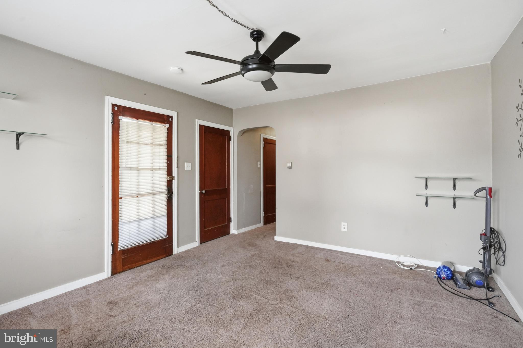 300 Delaware Avenue Riverside, NJ 08075 - Photo 67 of 86 a view of a livingroom with a ceiling fan and window