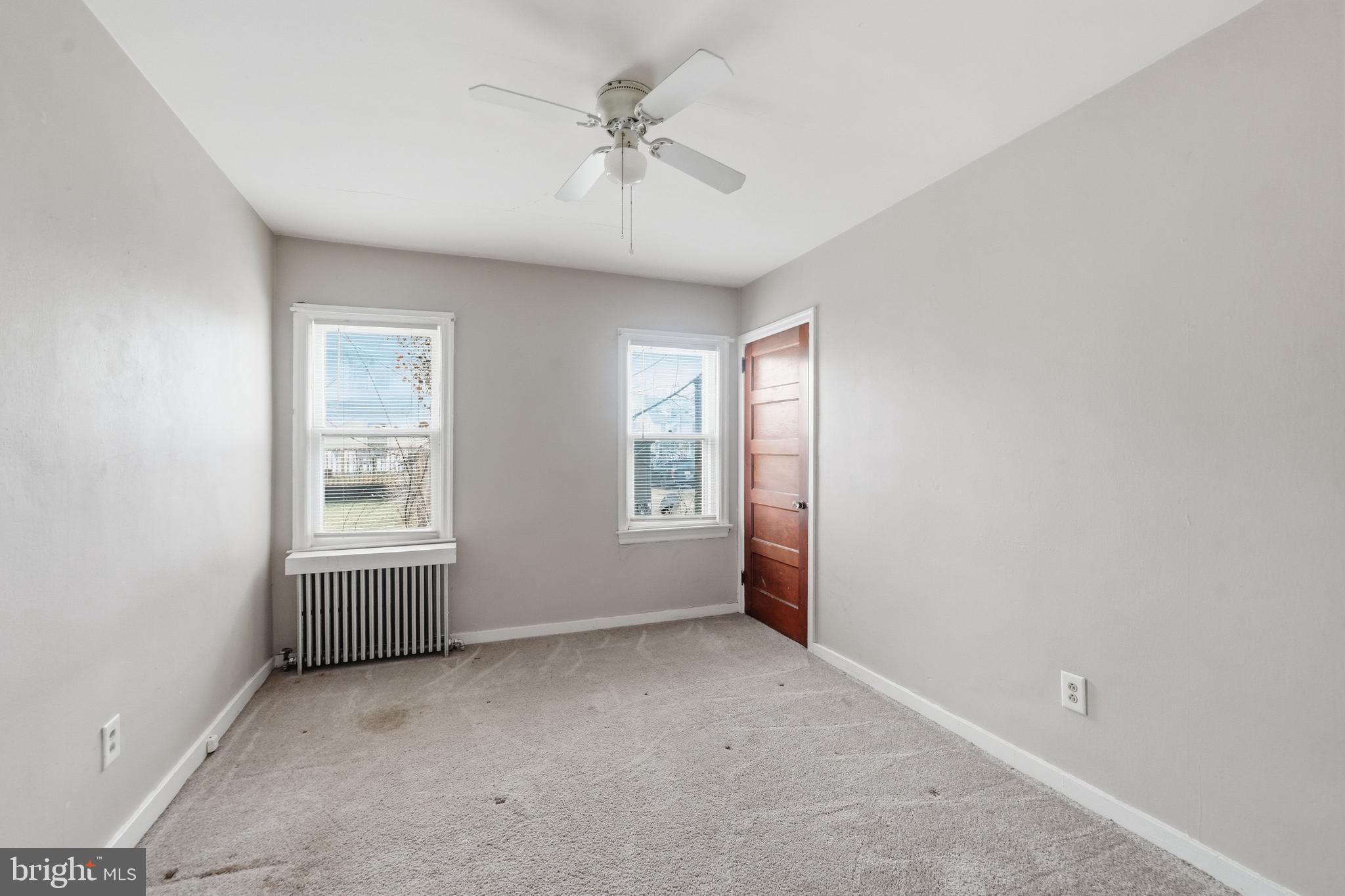 300 Delaware Avenue Riverside, NJ 08075 - Photo 68 of 86 an empty room with windows and ceiling fan