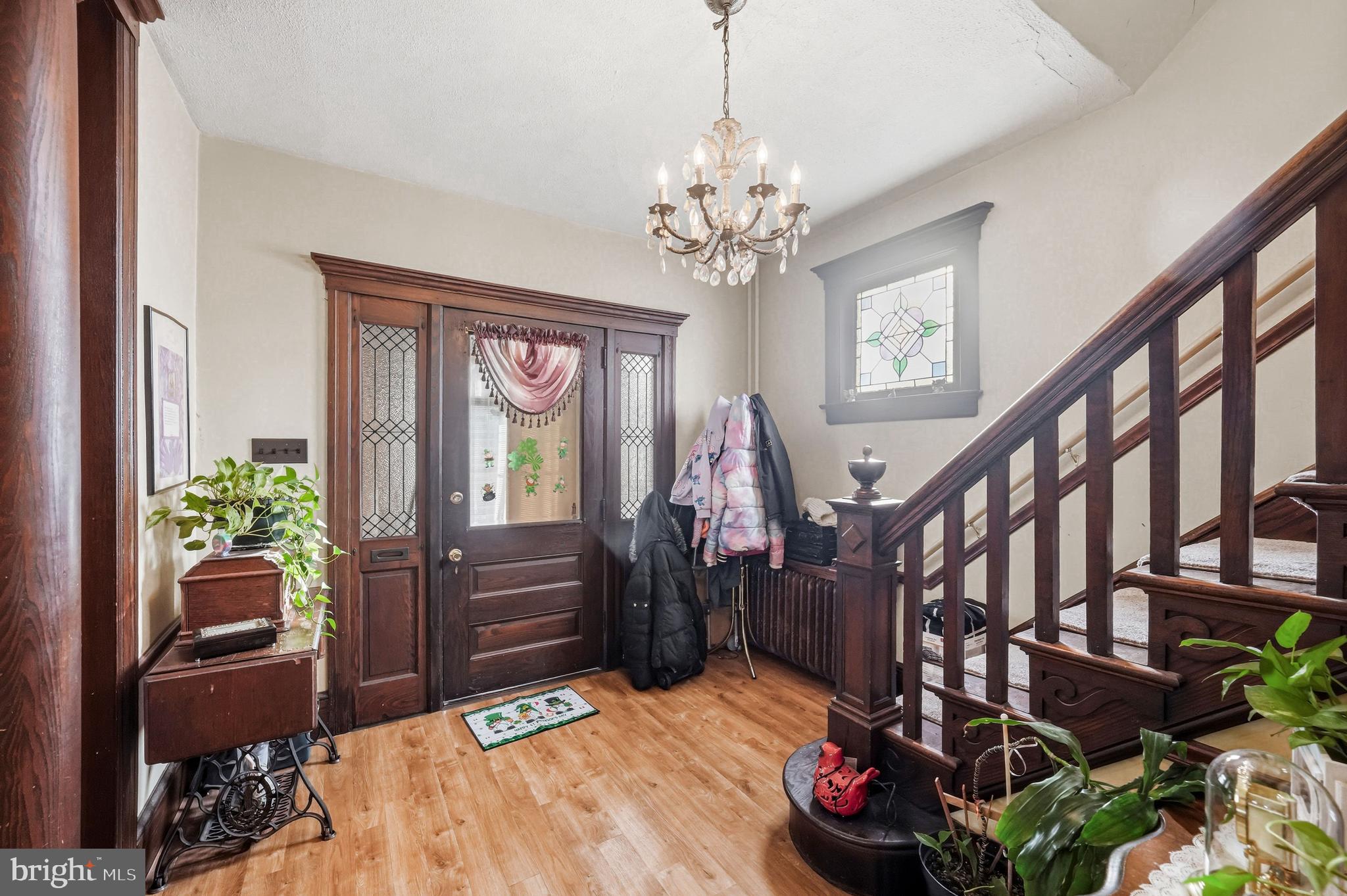 300 Delaware Avenue Riverside, NJ 08075 - Photo 10 of 86 a bedroom with furniture and a chandelier