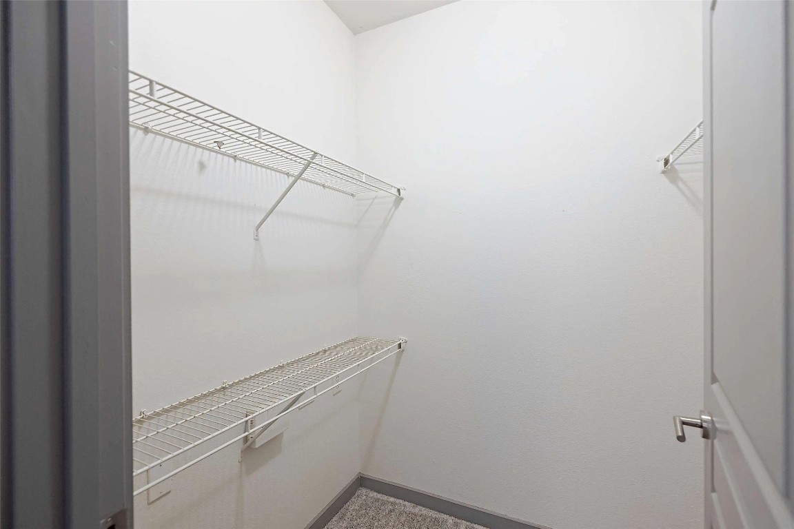 8515 Interstate 35, Unit 14119 Austin, TX 78744 - Photo 19 of 20 a view of a room with racks on the wall