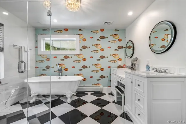 a bathroom with a sink a toilet and a mirror