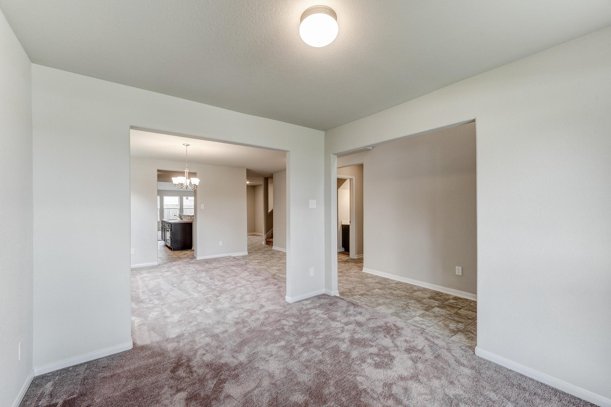 1015 Willowick Road Houston, TX 77090 - Photo 11 of 42 This inviting living room is perfect for entertaining and creating a cozy atmosphere for your guests.