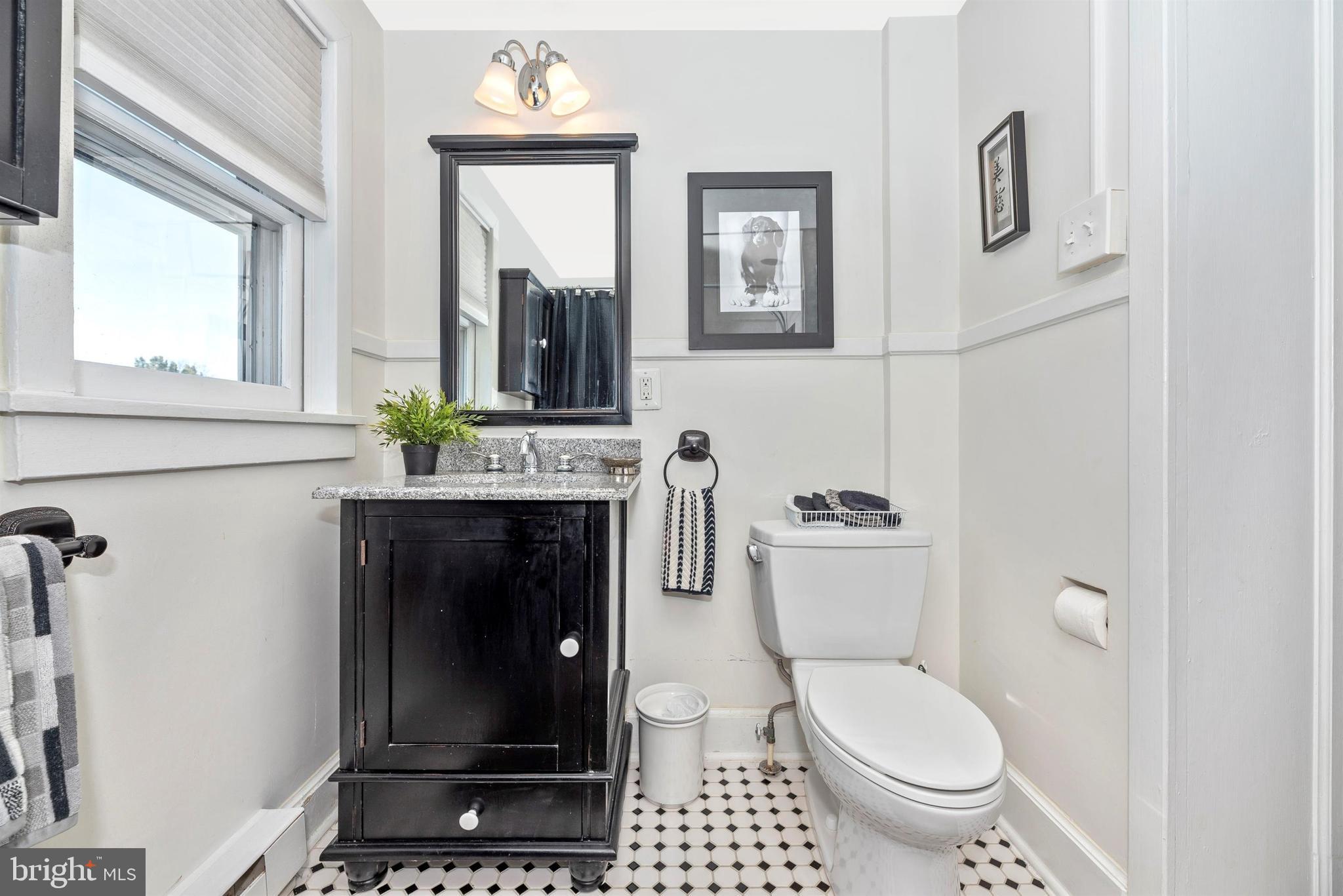 412 West Patrick Street Frederick, MD 21701 - Photo 22 of 36 Updated Floor, Fixtures & Vanity w/Granite Counter
