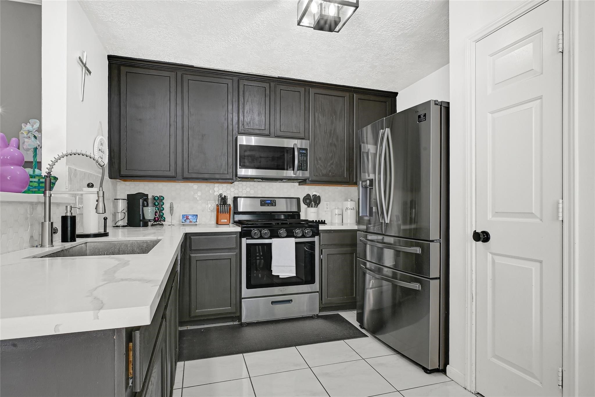 5007 Ridgeway Drive Pasadena, TX 77504 - Photo 3 of 8 Kitchen with Refrigerator