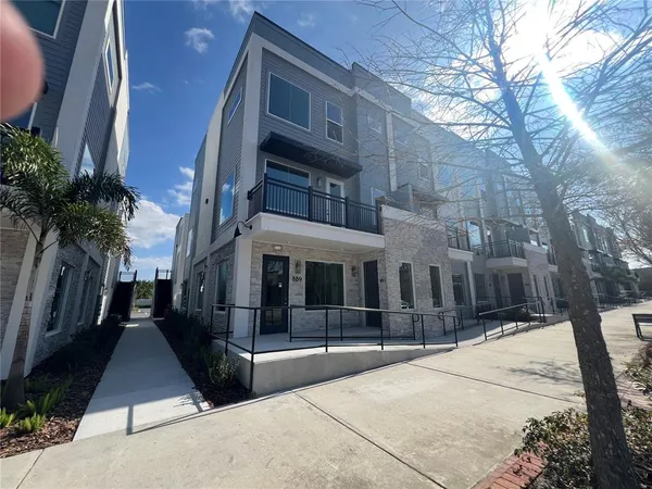 a view of a building with a tree
