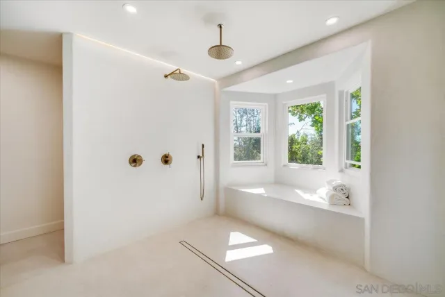 a bathroom with a sink toilet and vanity