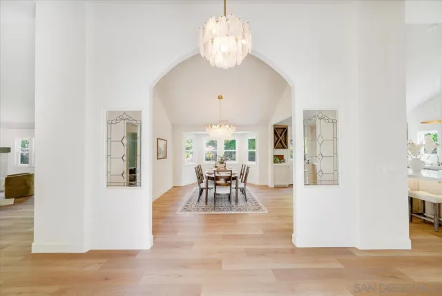 a kitchen with a table and chairs