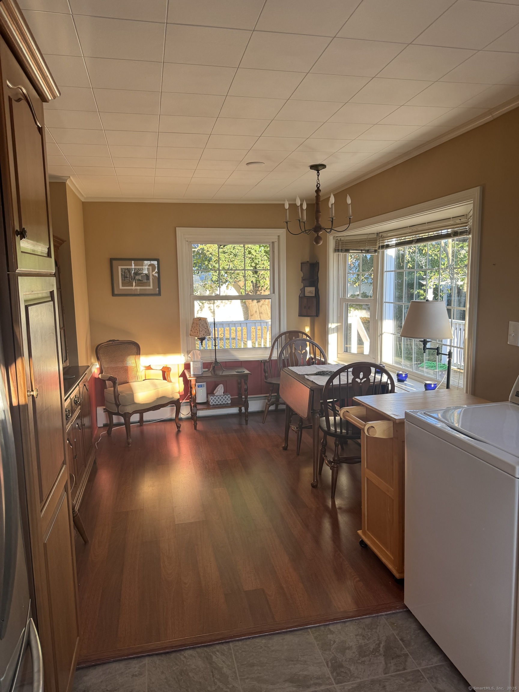 74 Uncas Road Clinton, CT 06413 - Photo 14 of 25 a living room with furniture and a large window