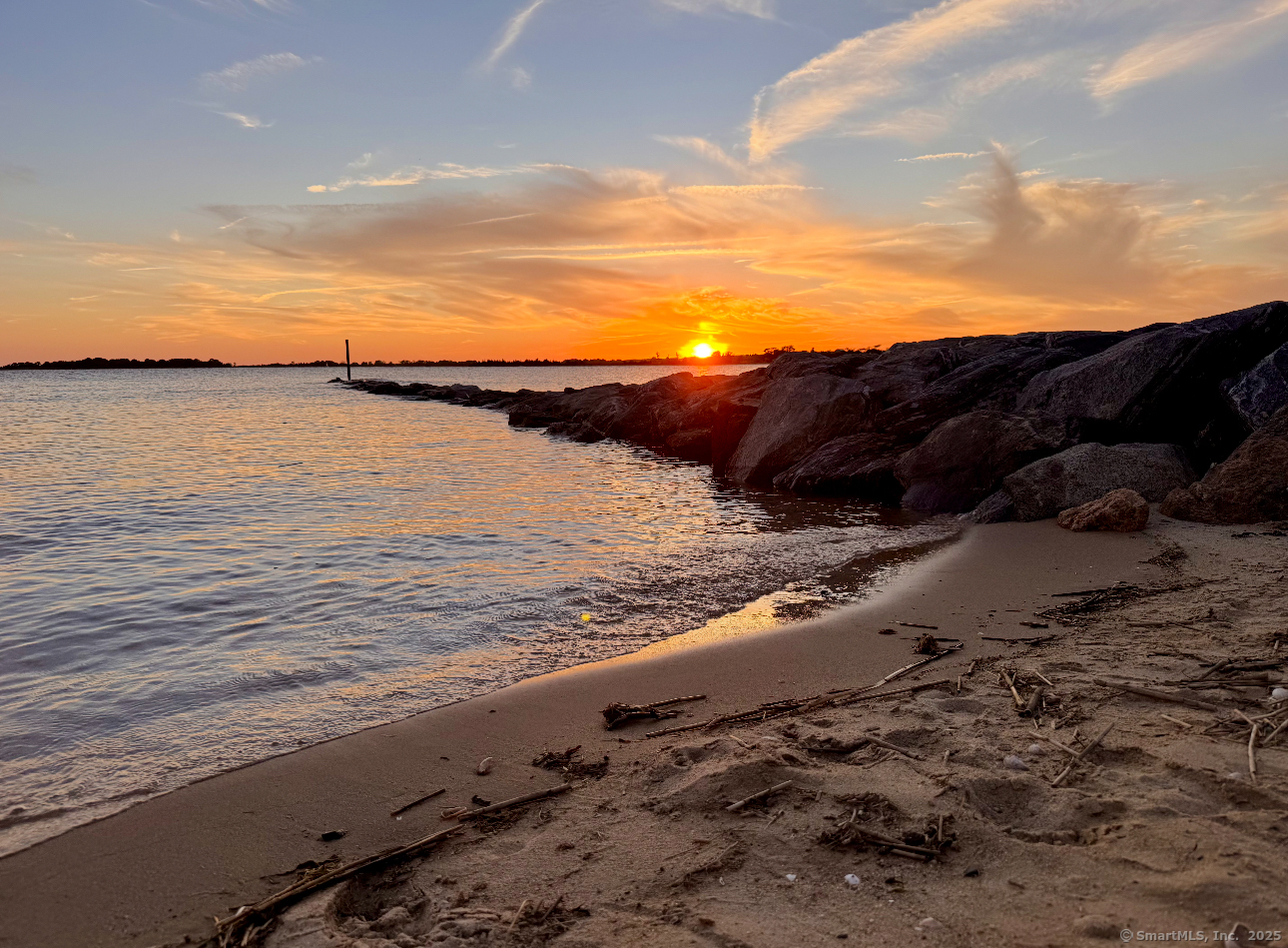 74 Uncas Road Clinton, CT 06413 - Photo 23 of 25 a view of an ocean beach