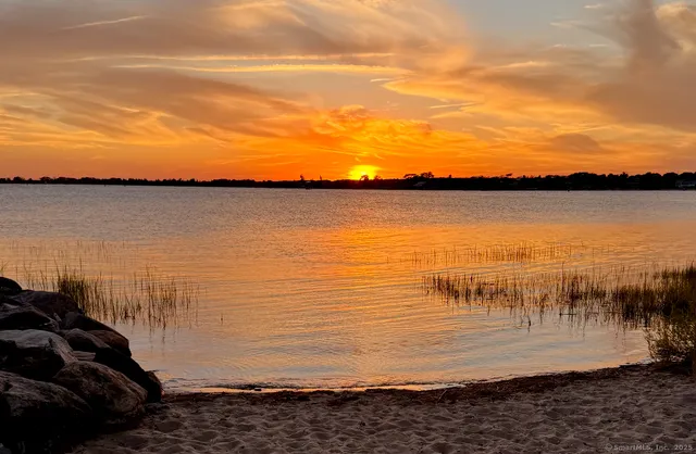 a view of a ocean with beach