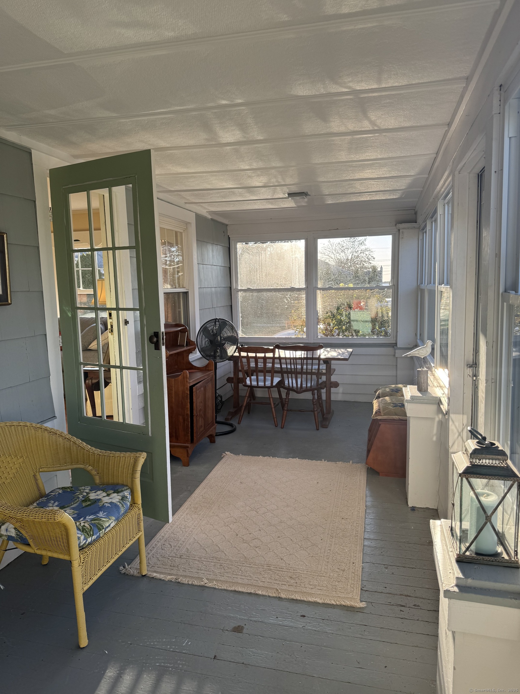 74 Uncas Road Clinton, CT 06413 - Photo 3 of 25 a living room with furniture and a table