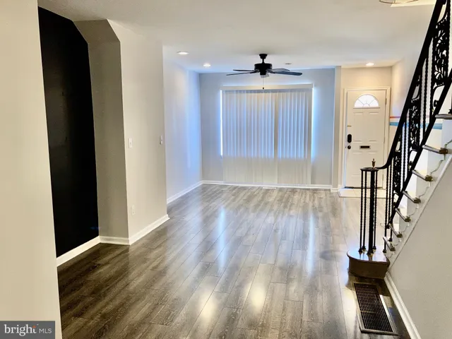 a view of entryway with wooden floor