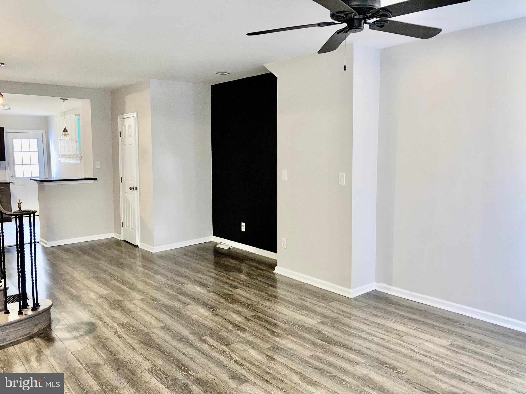 2647 South 12th Street Philadelphia, PA 19148 - Photo 5 of 19 a view of an empty room with wooden floor