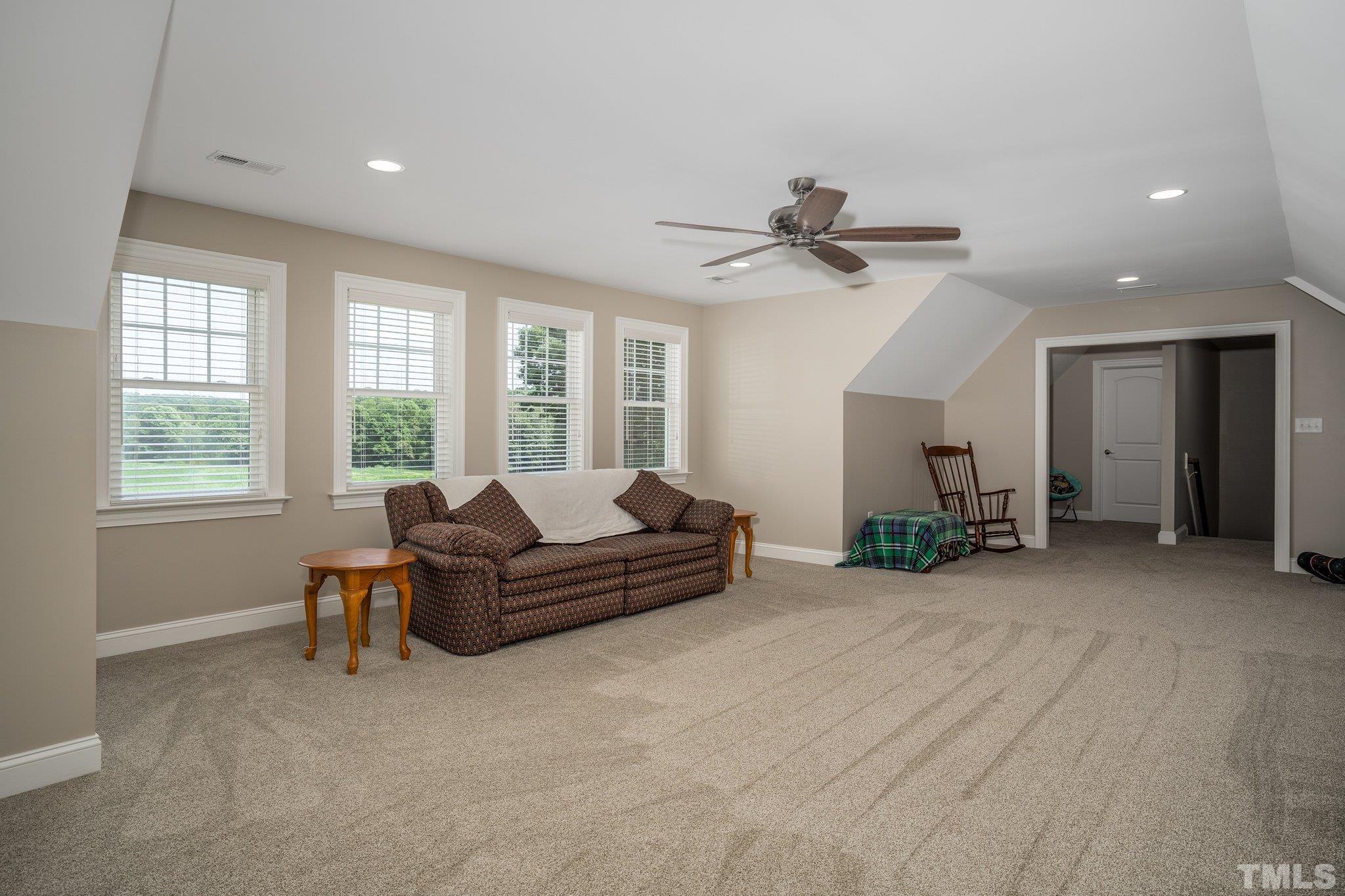 5207 Sandbridge Road Bailey, NC 27807 - Photo 22 of 30 a living room with furniture and a large window