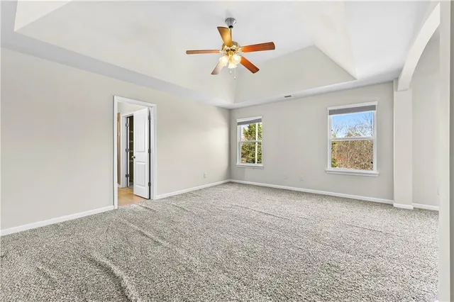 a bathroom with double sink and a mirror