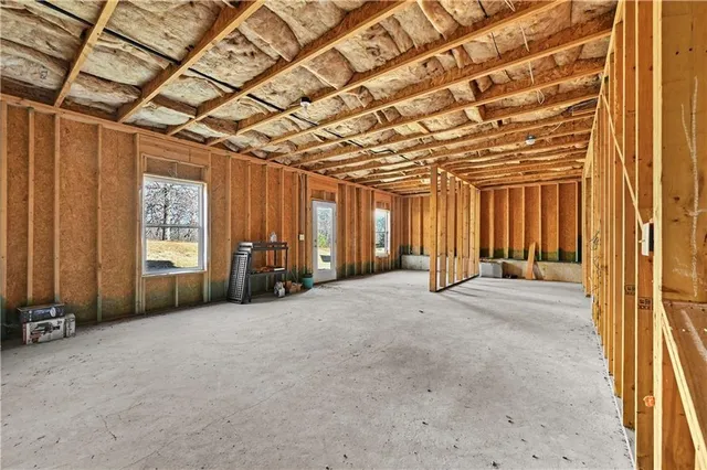 a view of wooden balcony with wooden floor and fence
