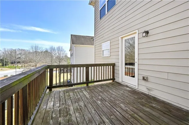 a view of house with backyard