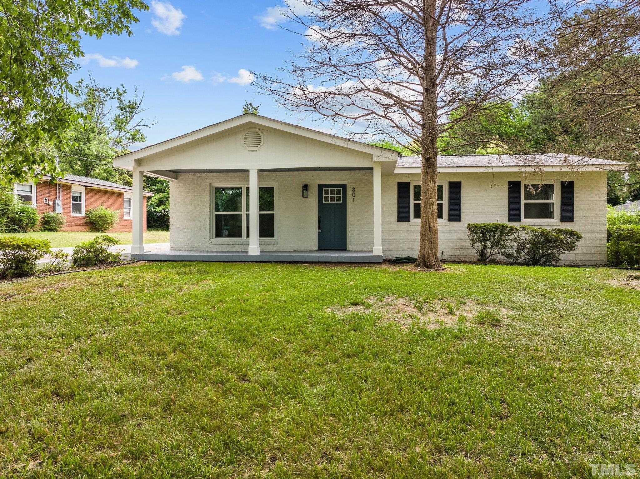 801 Friar Tuck Road Raleigh, NC 27610 - Photo 1 of 24 a front view of house with yard and green space