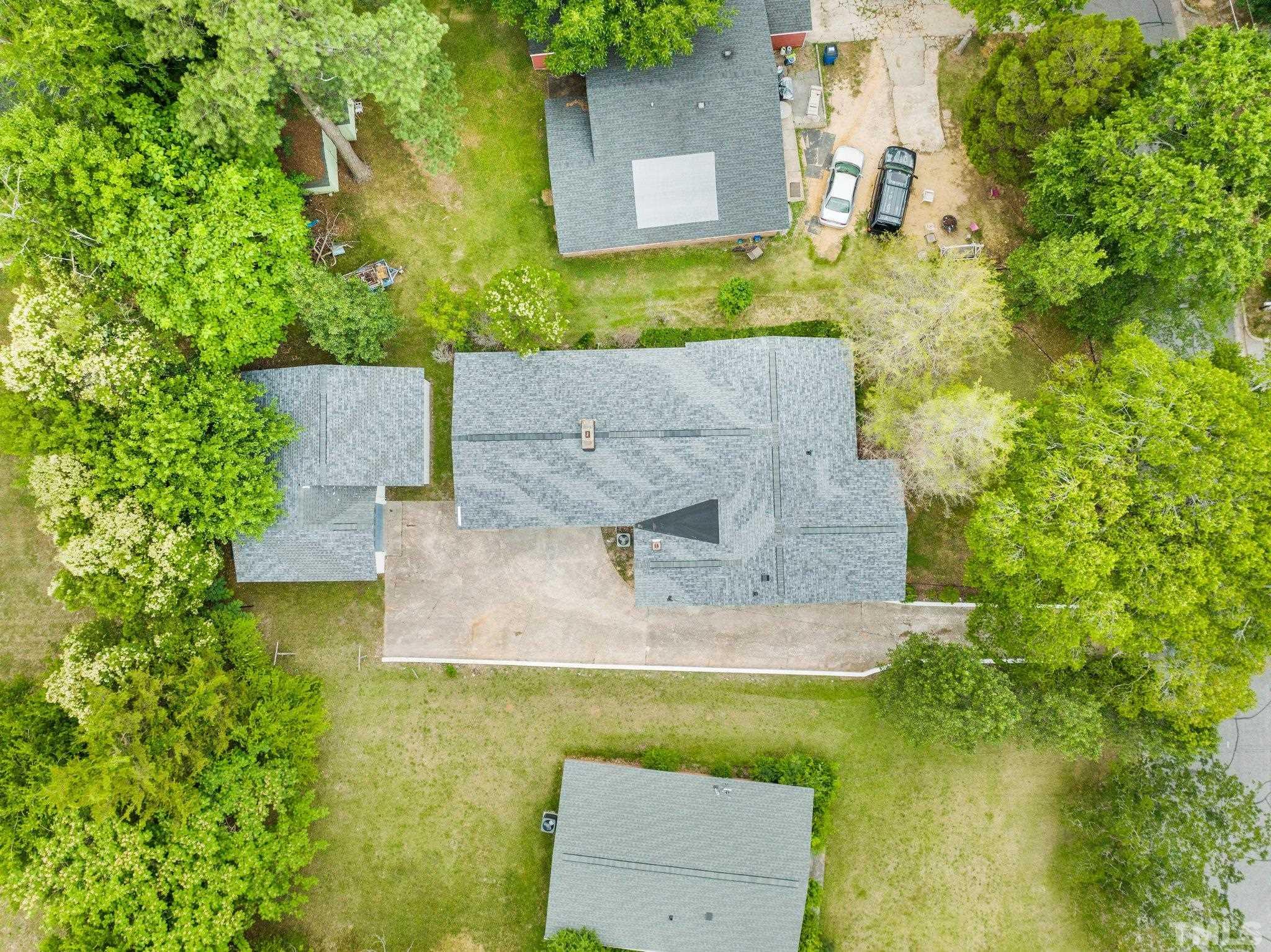 801 Friar Tuck Road Raleigh, NC 27610 - Photo 12 of 24 an aerial view of a house with a yard