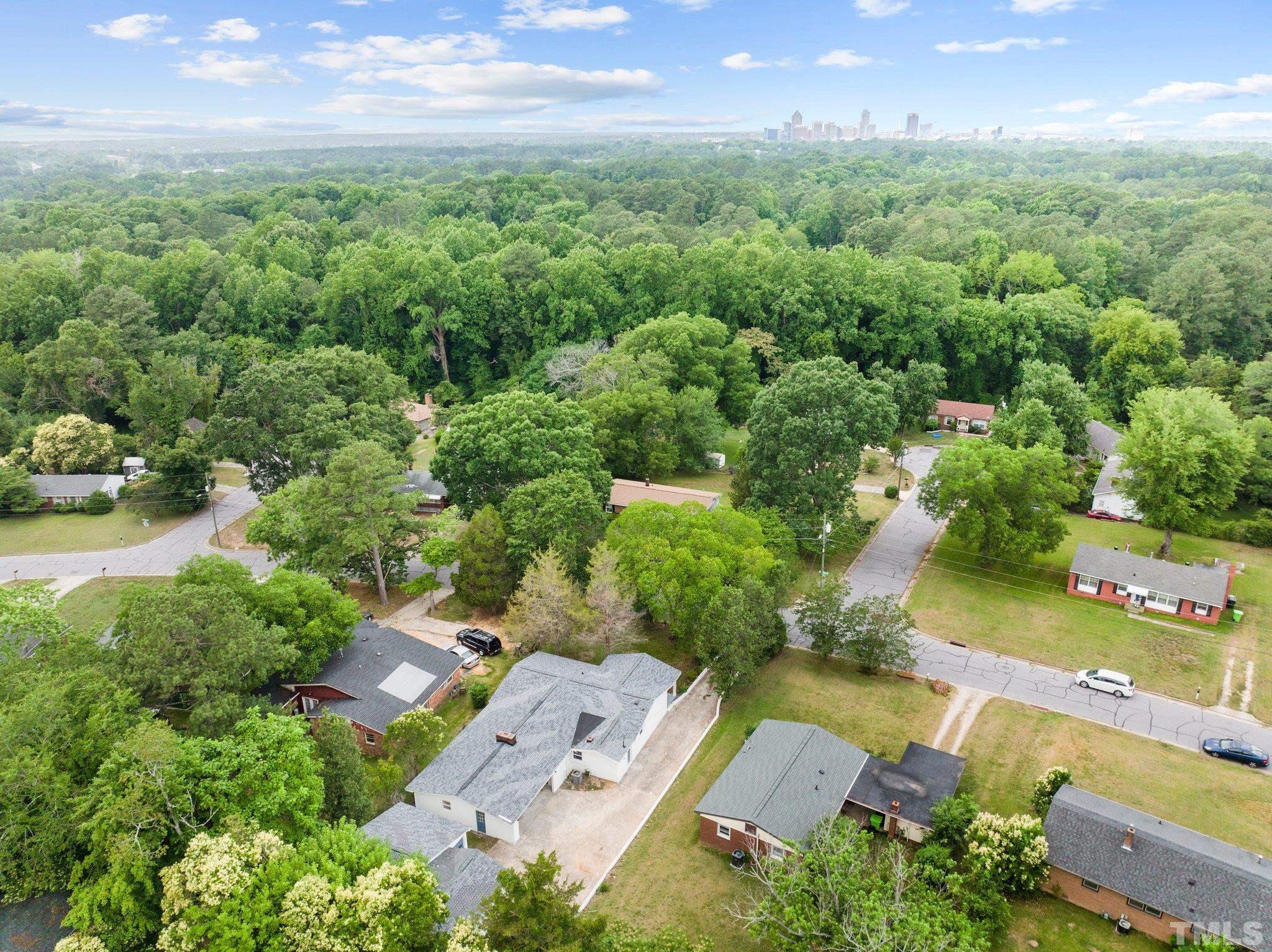801 Friar Tuck Road Raleigh, NC 27610 - Photo 13 of 24 an aerial view of multiple house