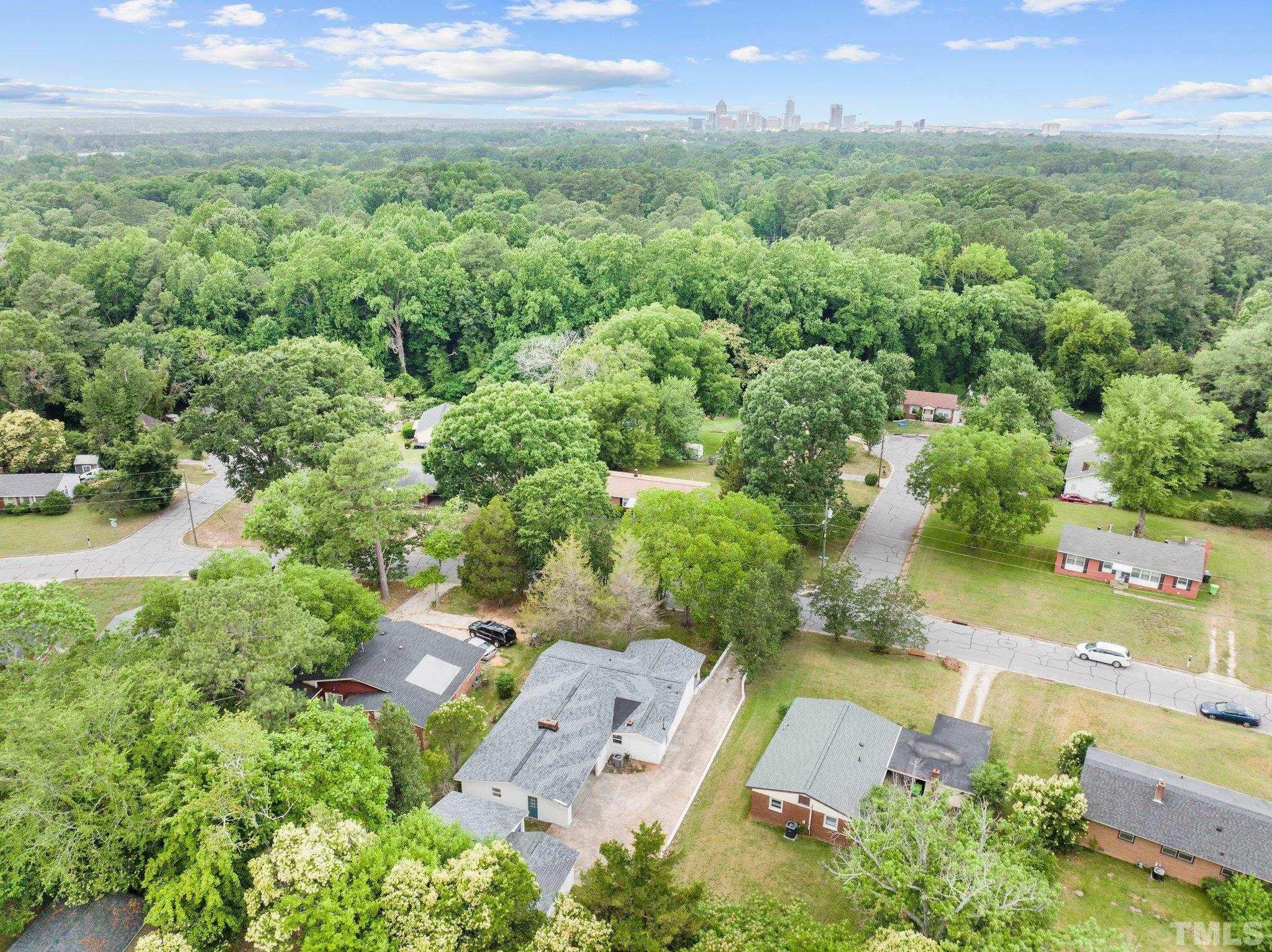 801 Friar Tuck Road Raleigh, NC 27610 - Photo 14 of 24 an aerial view of a house with a garden