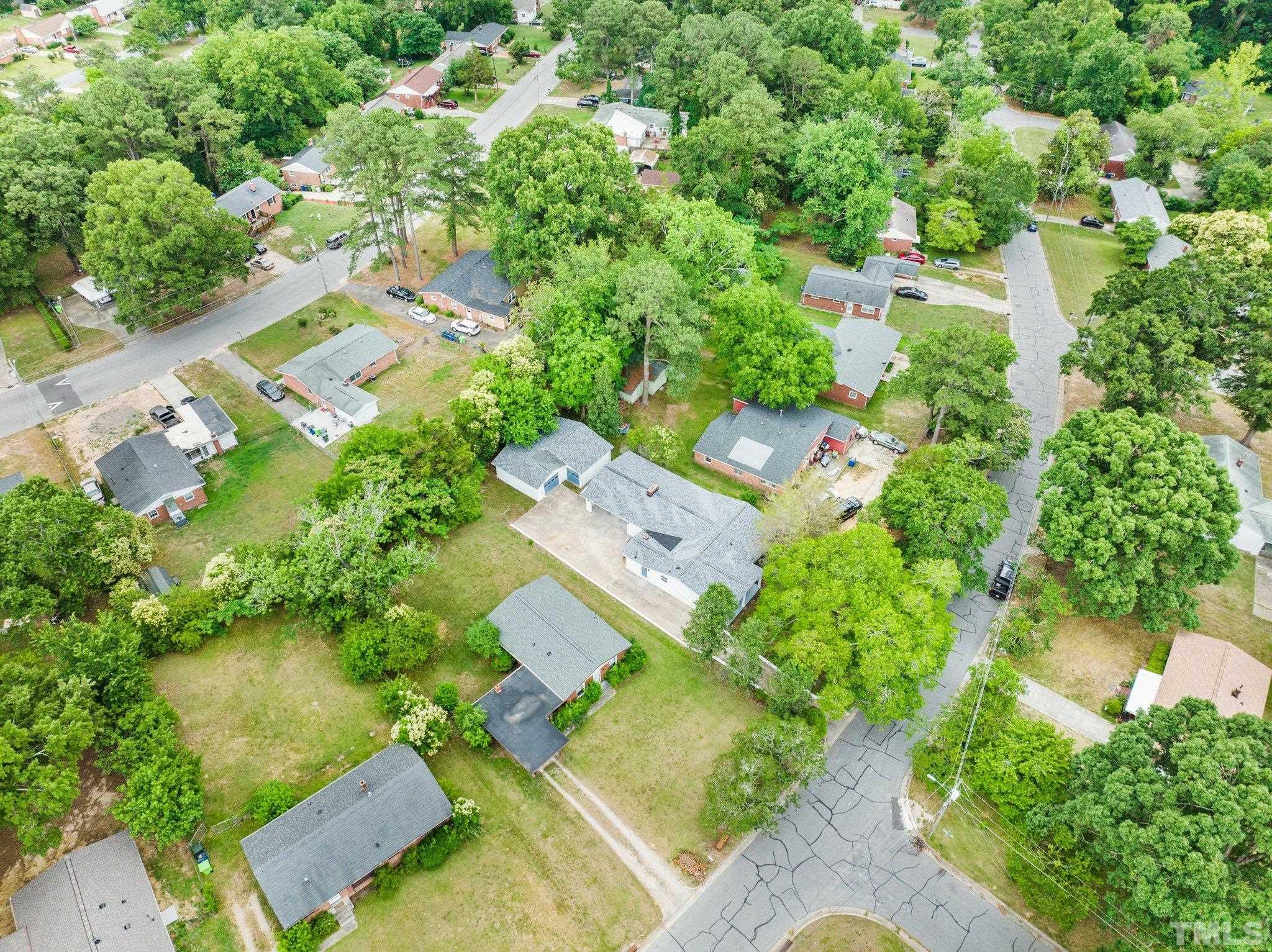 801 Friar Tuck Road Raleigh, NC 27610 - Photo 18 of 24 an aerial view of residential house with outdoor space and trees all around