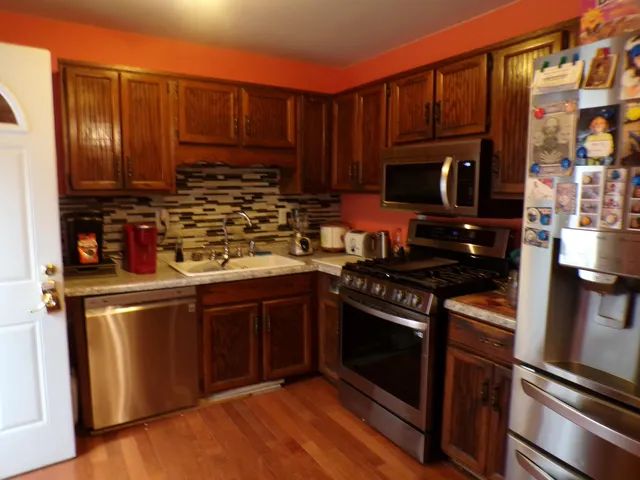 a house view with a backyard space