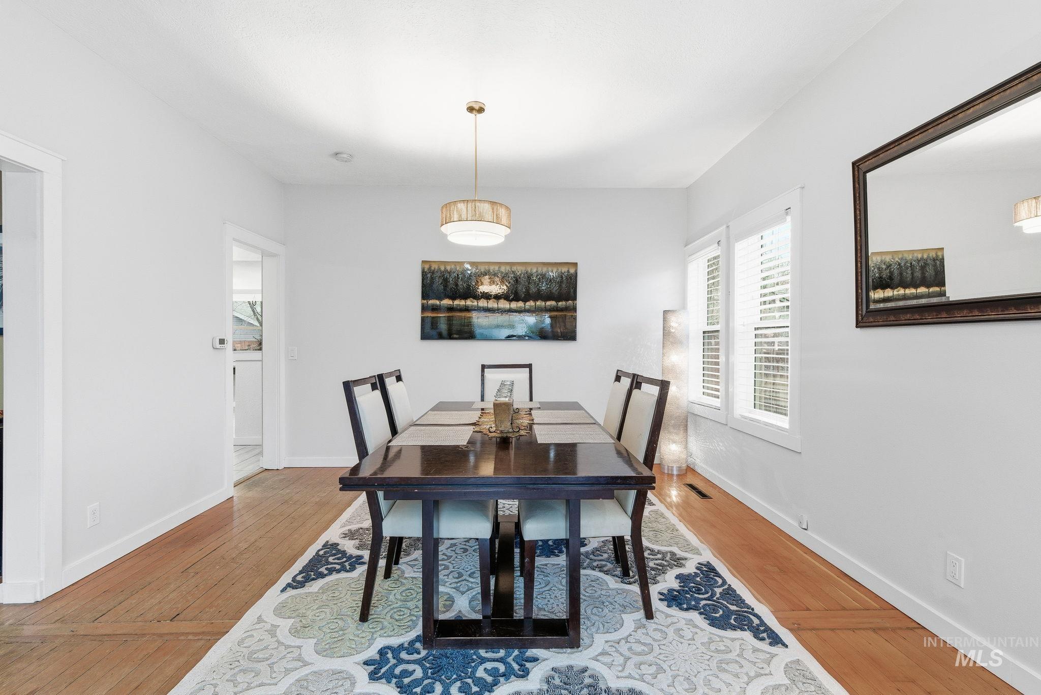 2103 West Bannock Street Boise, ID 83702 - Photo 13 of 49 Dining space featuring light wood-style floors