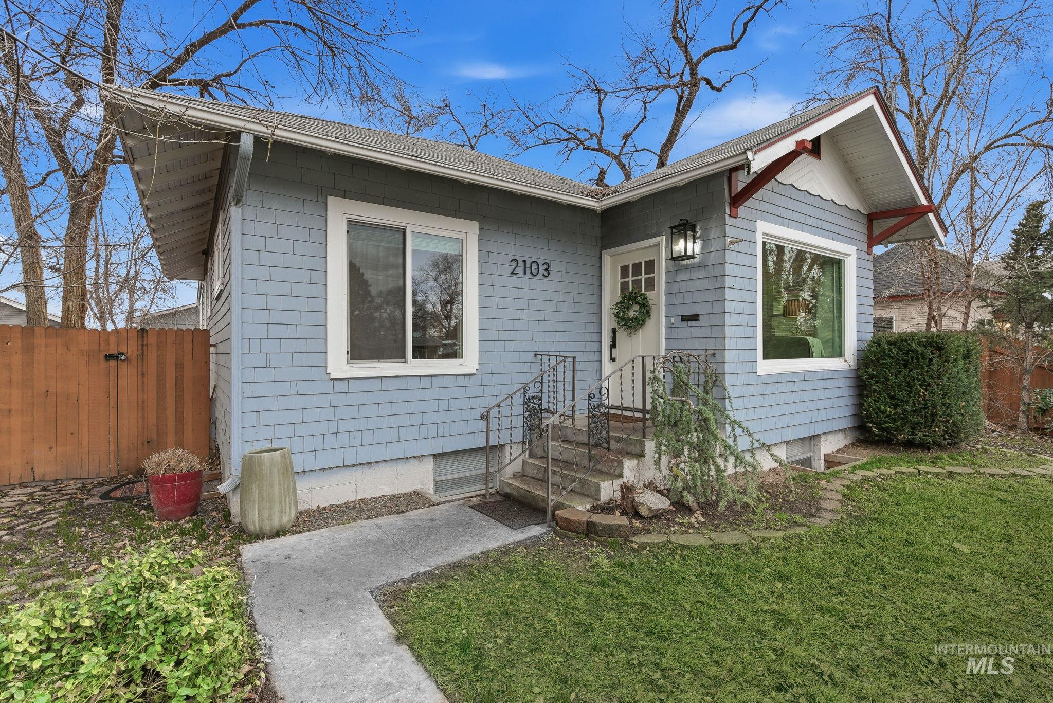 2103 West Bannock Street Boise, ID 83702 - Photo 2 of 49 View of front of property featuring a shingled roof