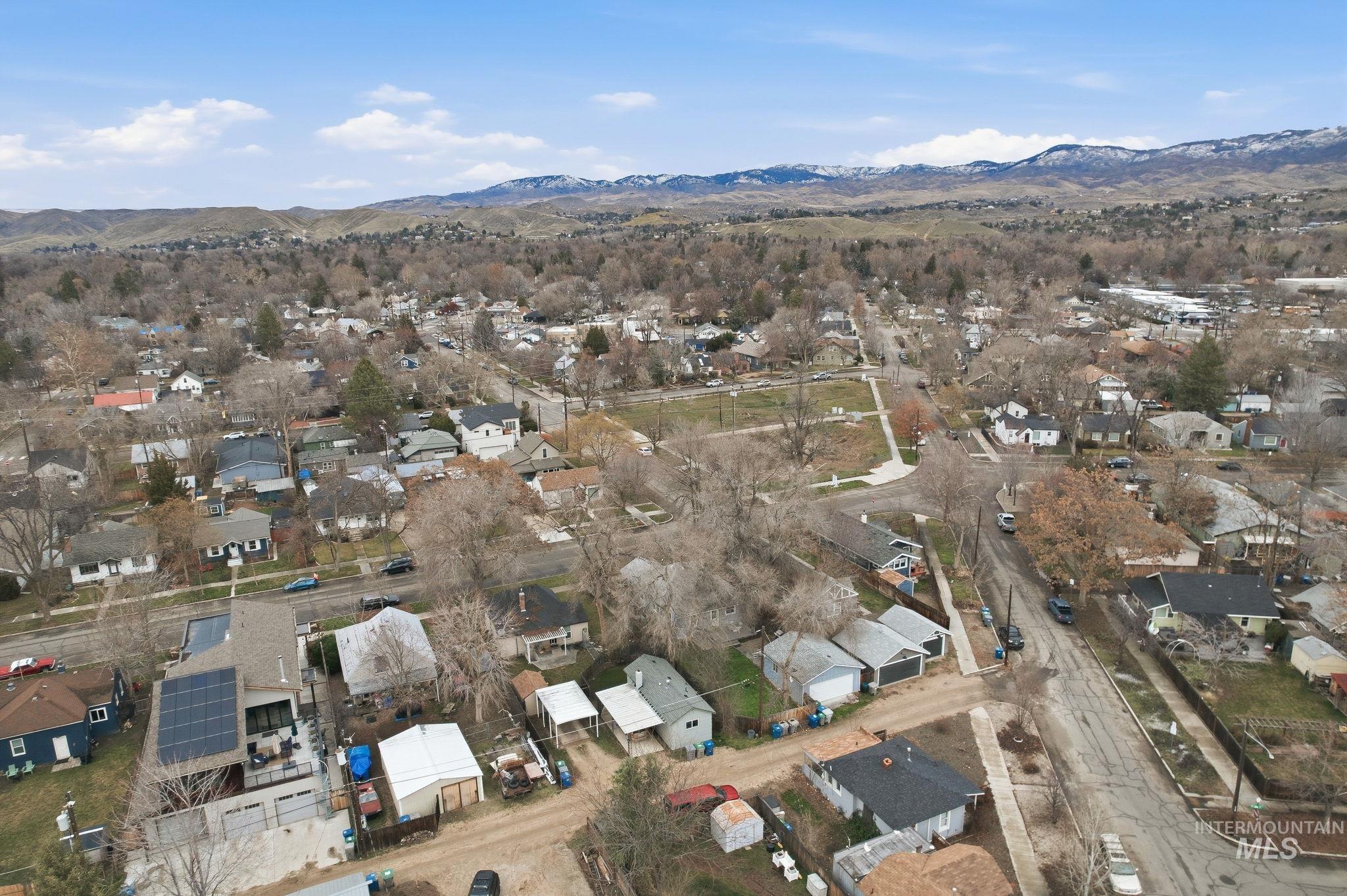 2103 West Bannock Street Boise, ID 83702 - Photo 46 of 49 Aerial overview of property's location featuring nearby suburban area and a mountain backdrop