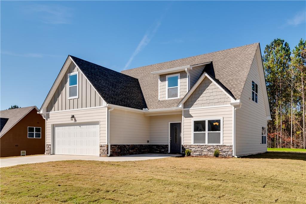 127 Cranbrooke Lane Dallas, GA 30157 - Photo 1 of 1 a front view of a house with a yard