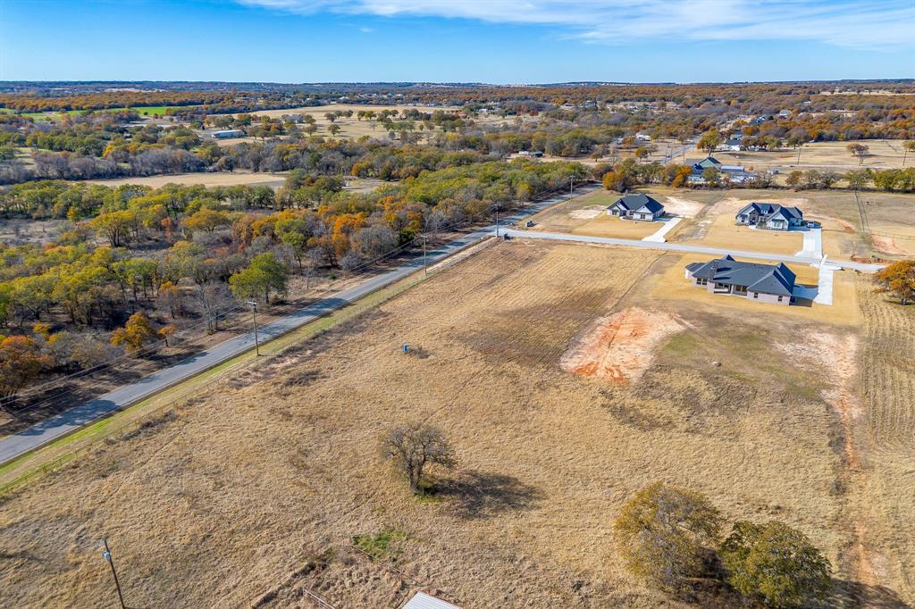 100 Prairie Winds Drive Poolville, TX 76487 - Photo 3 of 9 a view of a city