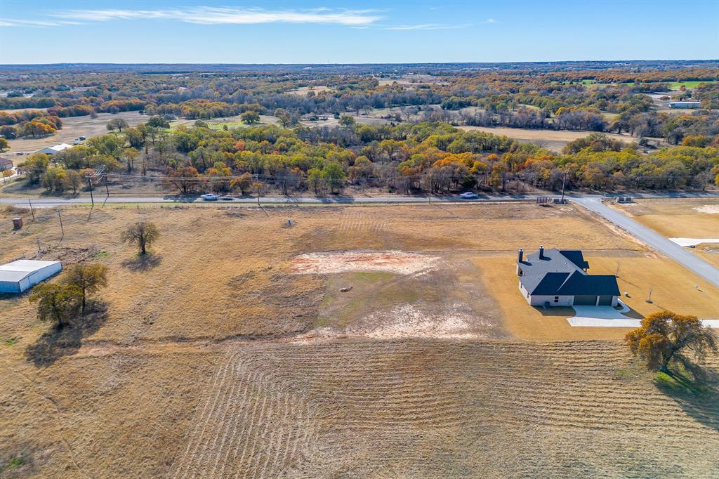 100 Prairie Winds Drive Poolville, TX 76487 - Photo 9 of 9 a view of city and ocean