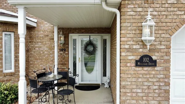 a door view with a outdoor seating space