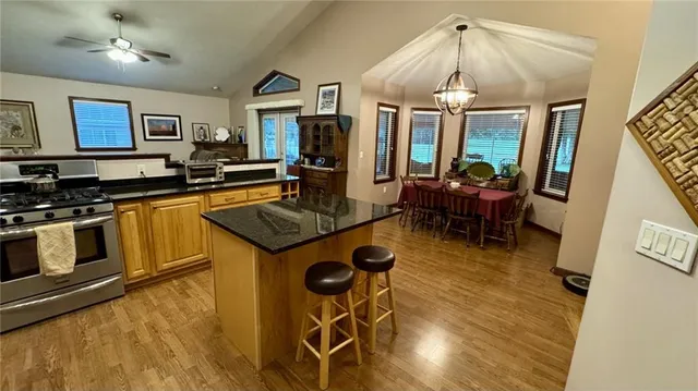 a dining room with furniture and window