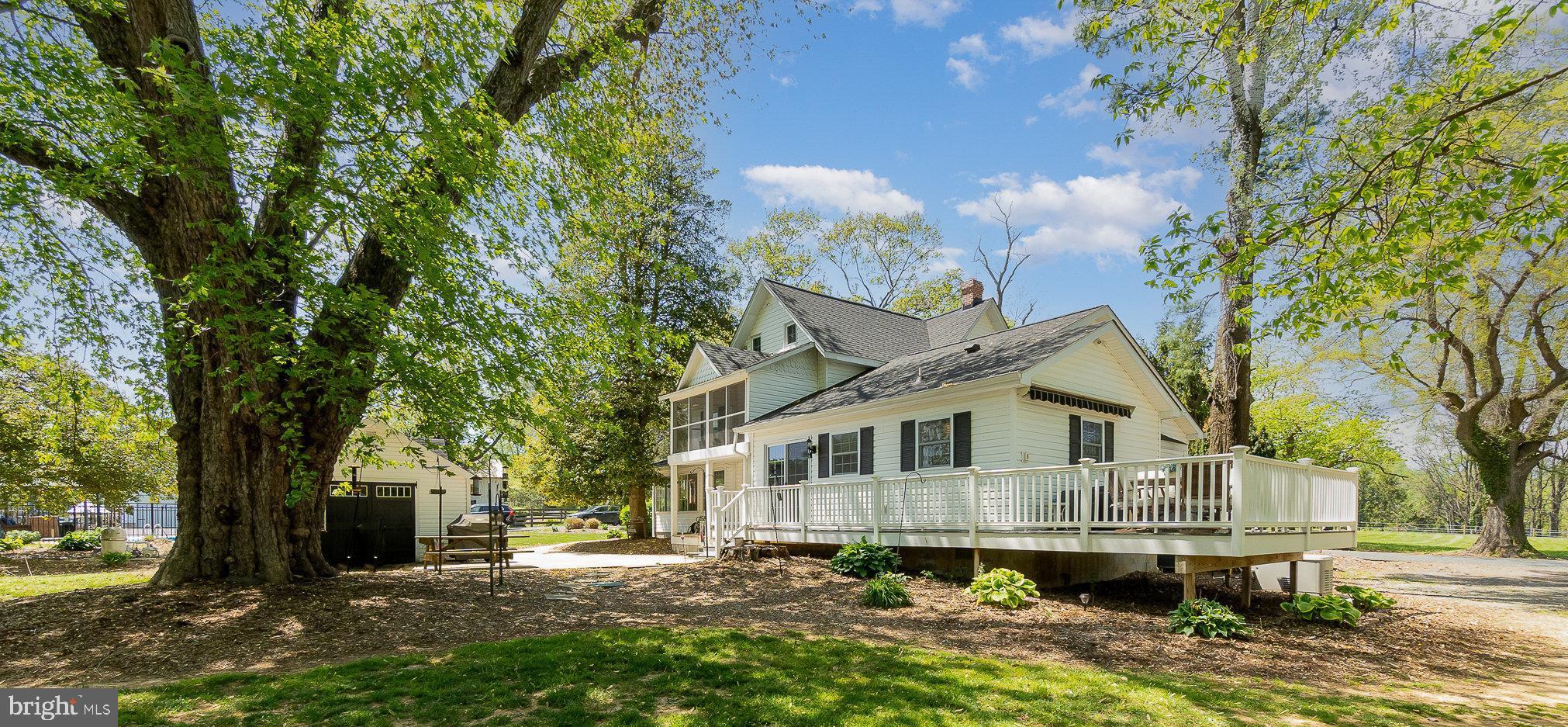 3247 Forge Hill Road Street, MD 21154 - Photo 6 of 49 Trex style decking wraps around w/ shaded views